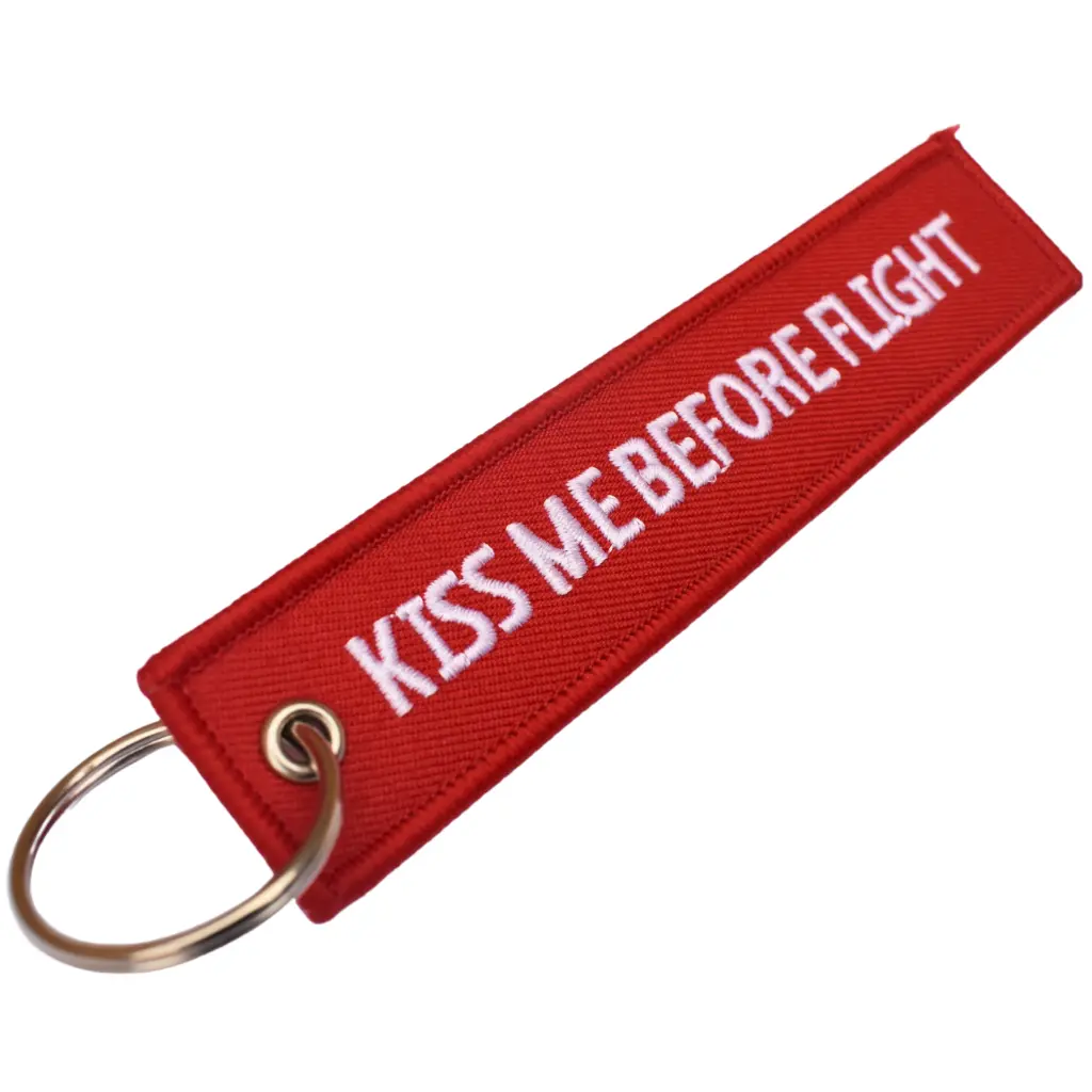 Llavero – Kiss me before flight red2.webp