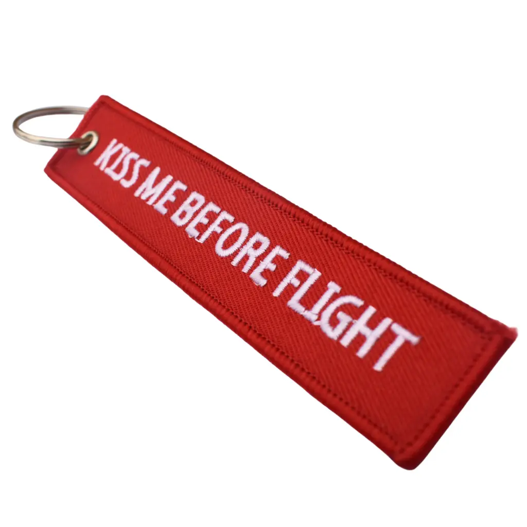 Llavero – Kiss me before flight red3.webp