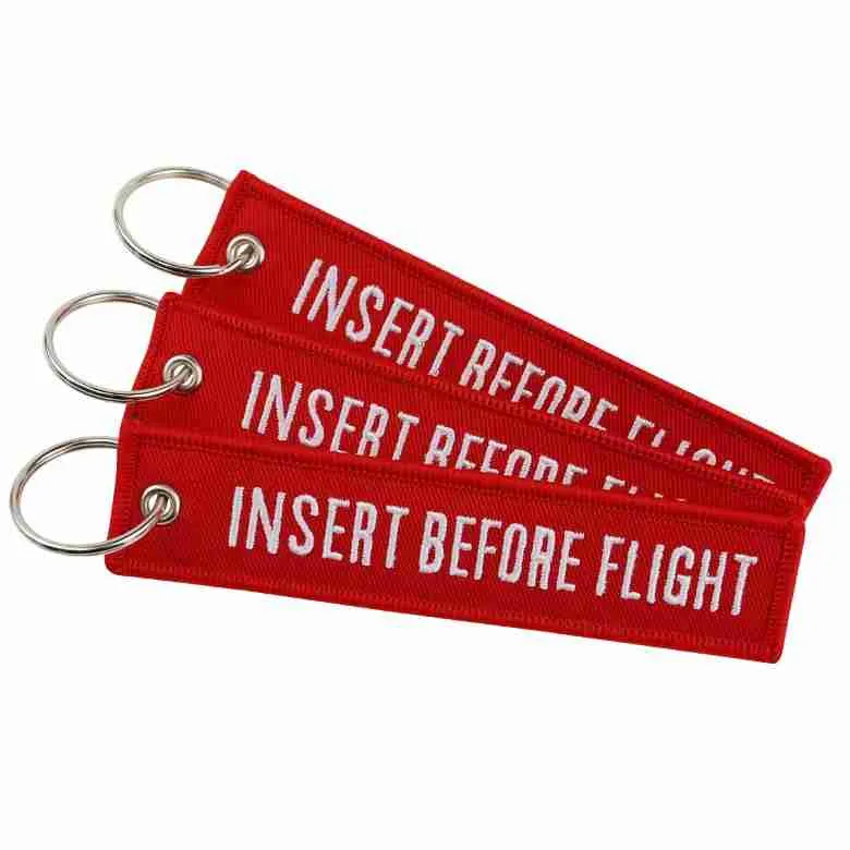 Llavero INSERT BEFORE FLIGHT Rojo