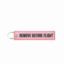 Llavero REMOVE BEFORE FLIGHT - Rosado